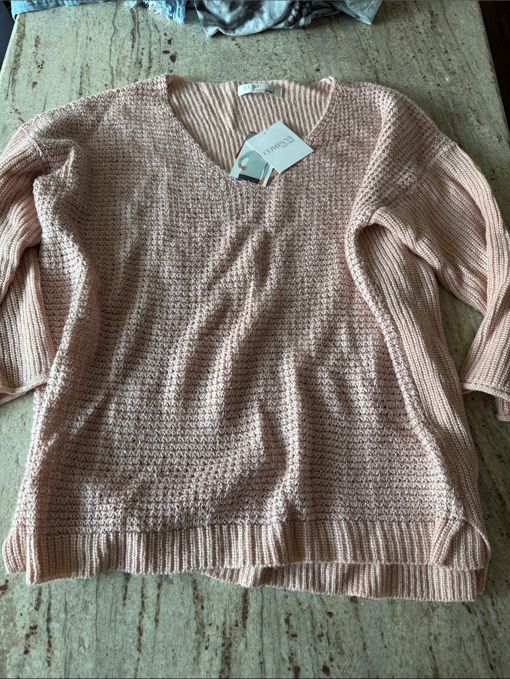 Ellen Tracy Lightweight V-Neck Sweater in Pale Pink has sparkle on the front